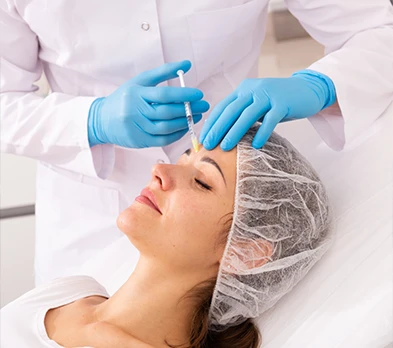 Ohio Facial Plastics’  Photo Female Receiving Injectable Treatment for Frown Lines